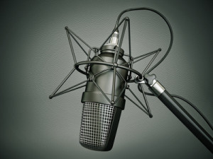 studio microphone isolated on a dark  background